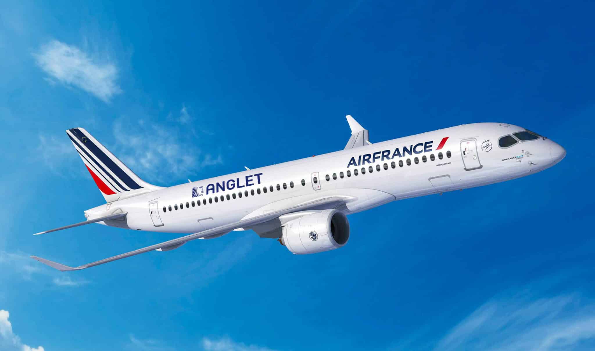 Photo of a plane in the air.